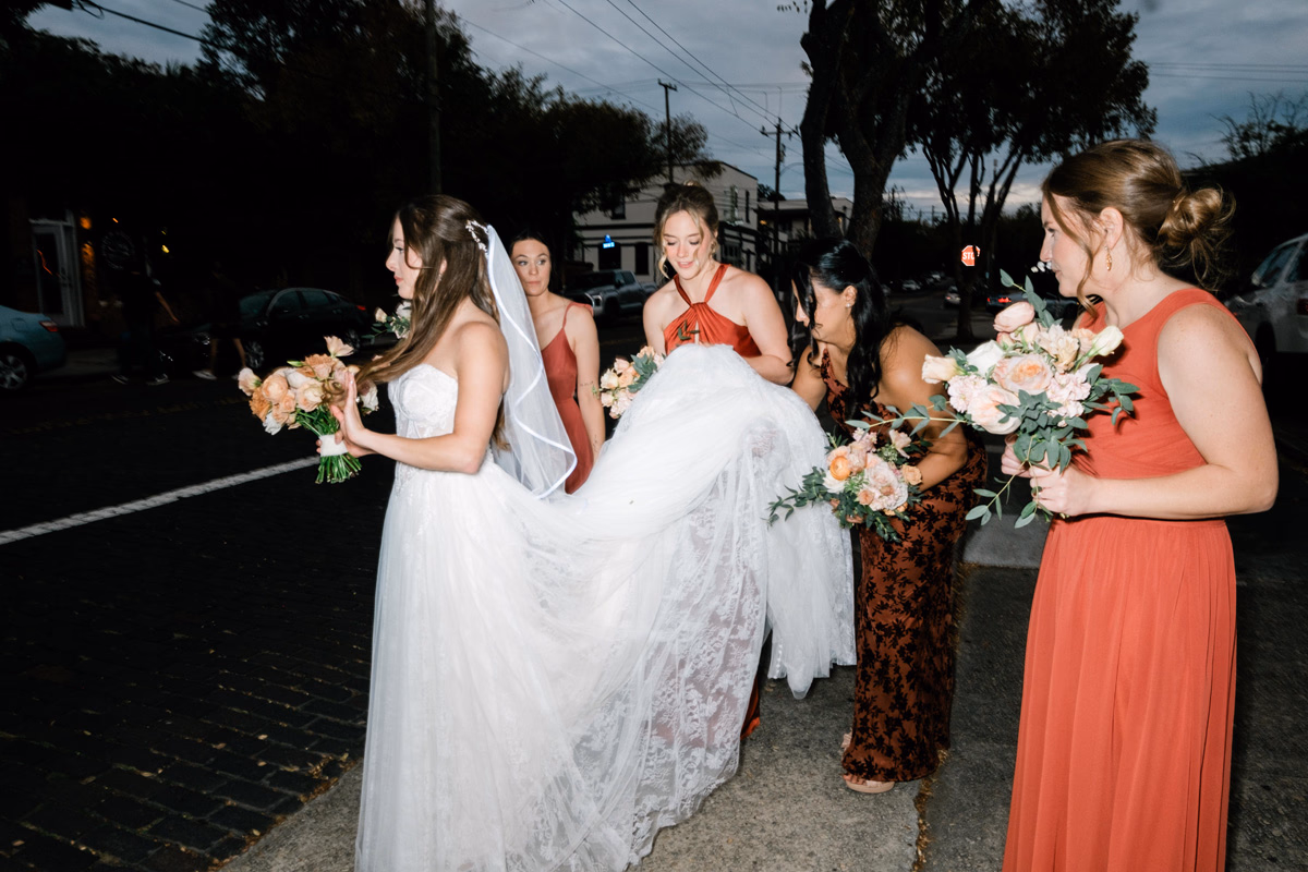 Bride and groom sharing their first dance under the National Gallery of Art rotunda skylights in Washington DC