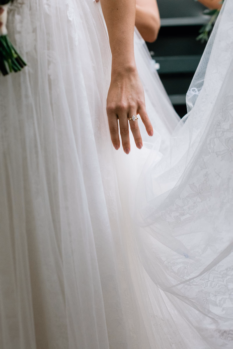 Couple embracing during golden hour engagement session at the Lincoln Memorial in Washington DC